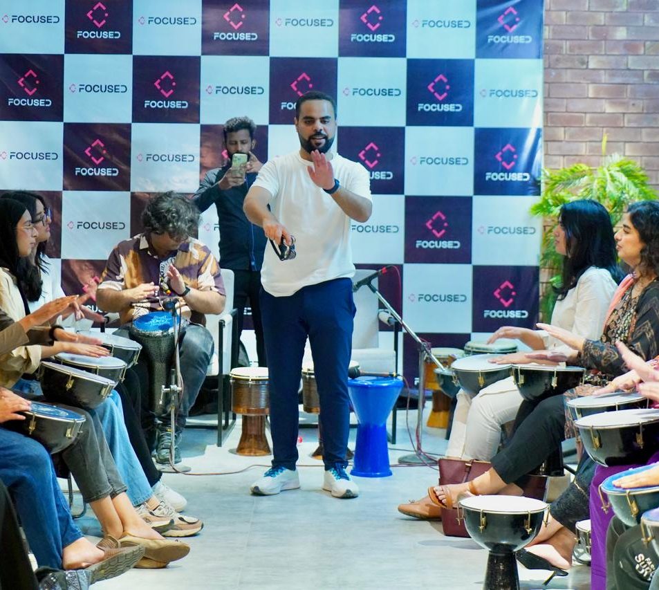 Haider Jamil conducting a corporate drum circle in Lahore, Drum Circle Pakistan