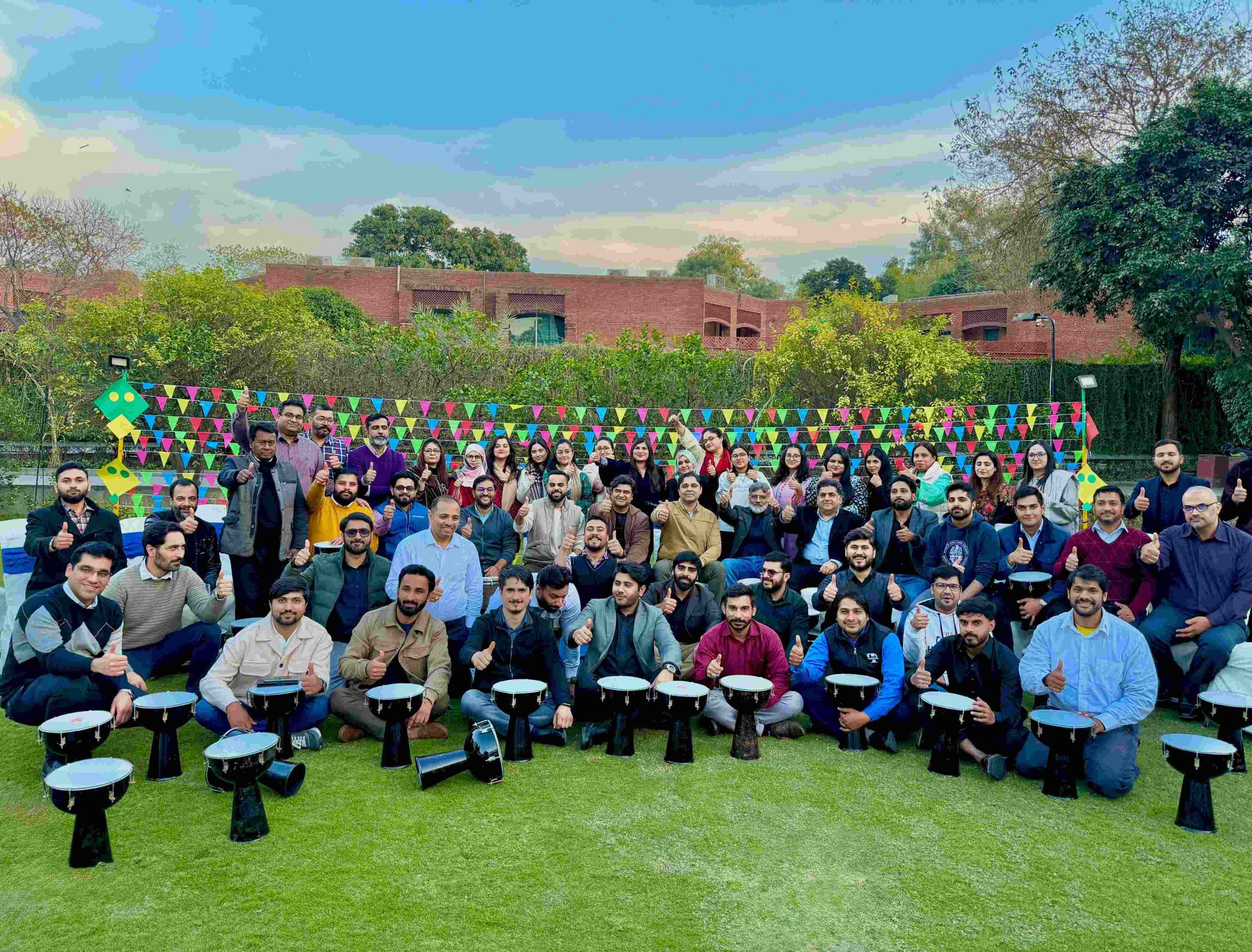 Drum Circle Pakistan team building session at IGI General Insurance Office for employees, corporate event